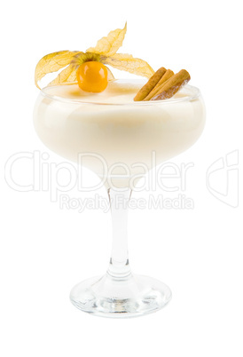 A delicious milkshake with a cape gooseberry and cinnamon