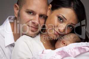 Mixed Race Young Family with Newborn Baby