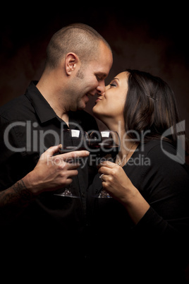 Happy Mixed Race Couple Holding Wine Glasses