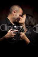 Happy Mixed Race Couple Holding Wine Glasses