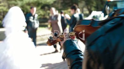 Just Married Couple Dancing To A Violin Accompaniment