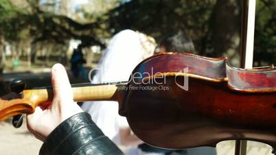 Just Married Couple Dancing To A Violin Accompaniment