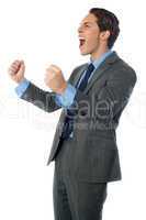 Portrait of an excited businessman