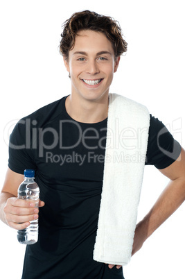 Handsome muscular man with towel