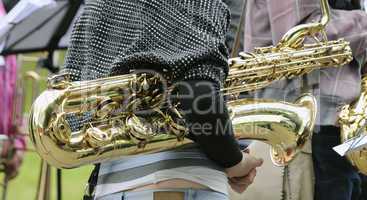 The musician with a Baritone saxophone