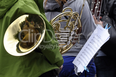 The musician with a French horn