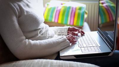 Woman With Laptop in the Lap