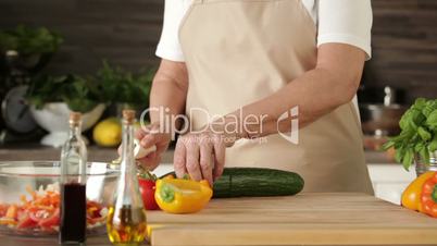 peeling and cutting cucumber