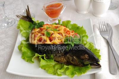 Mackerel stuffed with vegetables and cheese