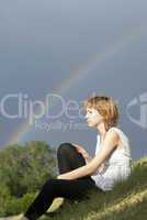Attractive girl and rainbow