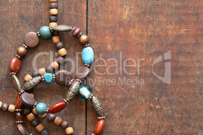 Costume Jewelry On Wood