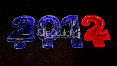 Happy New Year 2012, Time lapse ice is melting figures