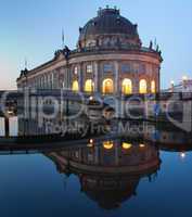 Bodemuseum (Bode Museum) panorama reflection, famous landmark in Berlin City, Germany at night