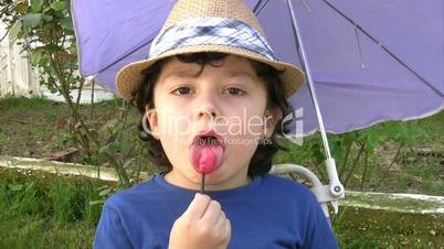 Little boy with lollipop