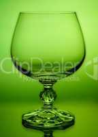 abstract green wineglass and background