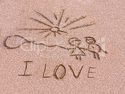 Inscription on sand I love