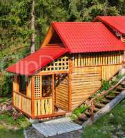 Building of the wooden house in wood