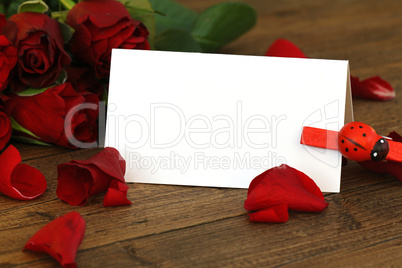 Tischkarte mit roten Rosen