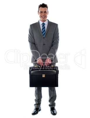 Comany's CEO holding his handbag
