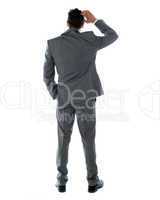 Back-pose of a corporate person thinking