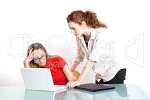 two business woman are discussing about a problem at work