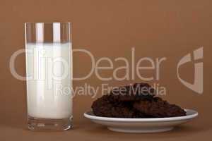 chocolate cookies with a glass of milk