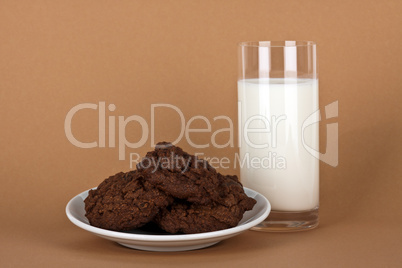 chocolate cookies with a glass of milk