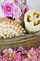pink flowers brush and sponge for wellness in a beauty spa