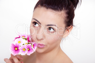 young beautiful brunette woman with flower