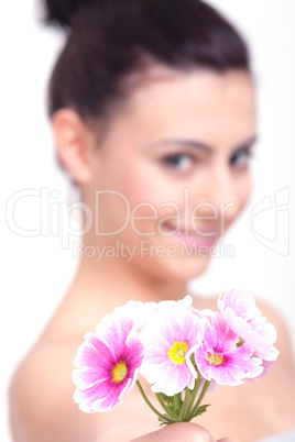 young beautiful brunette woman with flower