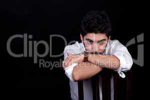 young successful business man with a suit isolated on black background