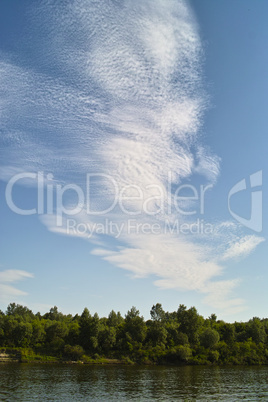 Summer river under cloudpath