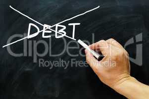 Debt being crossed out on a blackboard
