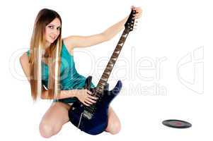 Pretty girl with electric guitar