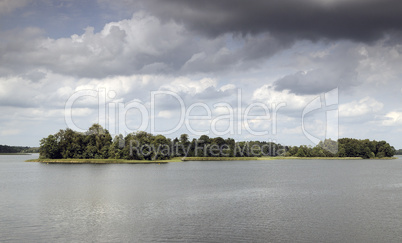 Lake under dark clouds