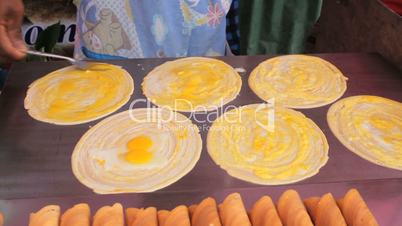 Street Vendor Makes Egg Crepes