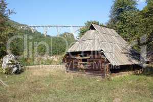 Wooden hut and bridge