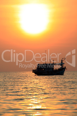 Boat and sun