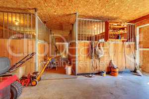 Inside of the horse farm with stables.