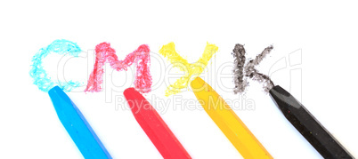 Sign of the CMYK from pastel crayons