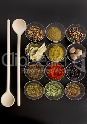 spices with wooden spoons