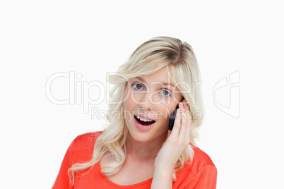 Happy woman talking with a cellphone