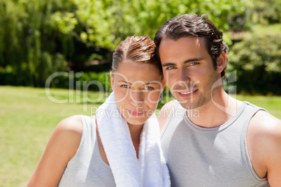 Woman and a man standing together in workout gear