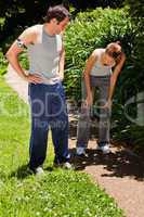 Man watching a woman while she is recovering