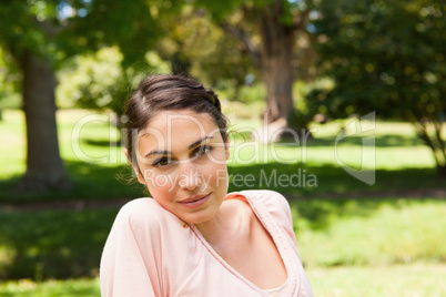 Woman with a serious expression looking ahead