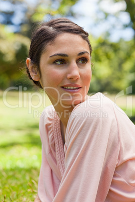Woman with curious expression looking to the side