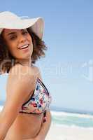 Young woman showing a great smile while standing in front of the