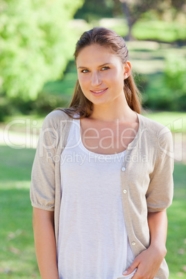 Smiling woman spending her day in the country side