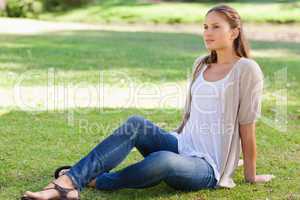 Woman relaxing on the lawn