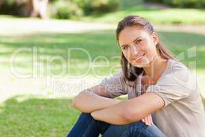 Smiling woman relaxing in the park
